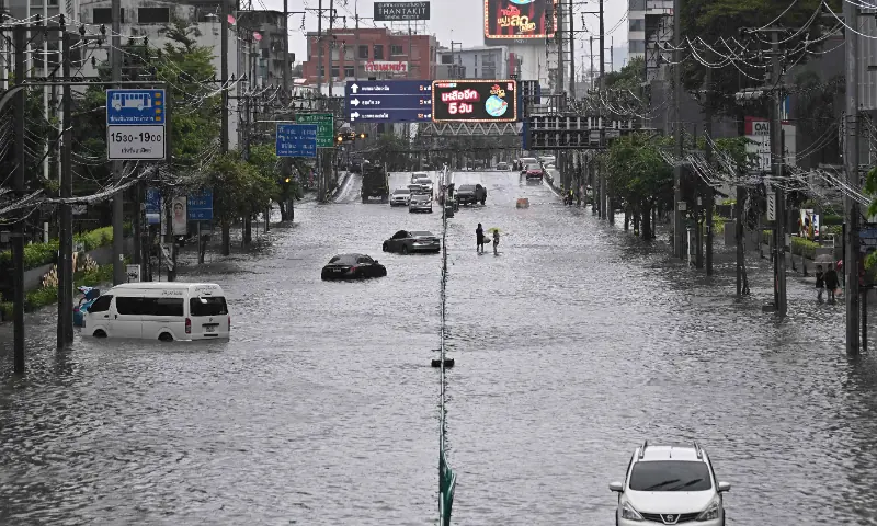 Thai capital Bangkok declares flood disaster after heavy rain leave canals full, roads submerged