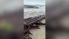 Watch: Shipwreck uncovered on Nantucket island during nor'easter storm