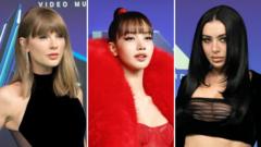 Taylor Swift and Charli XCX among stars to light up VMAs red carpet
