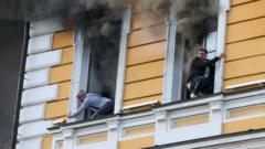 People escape historic Kyiv building hit by Russian drone