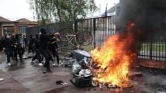 More than 400 detained as France student protests escalate